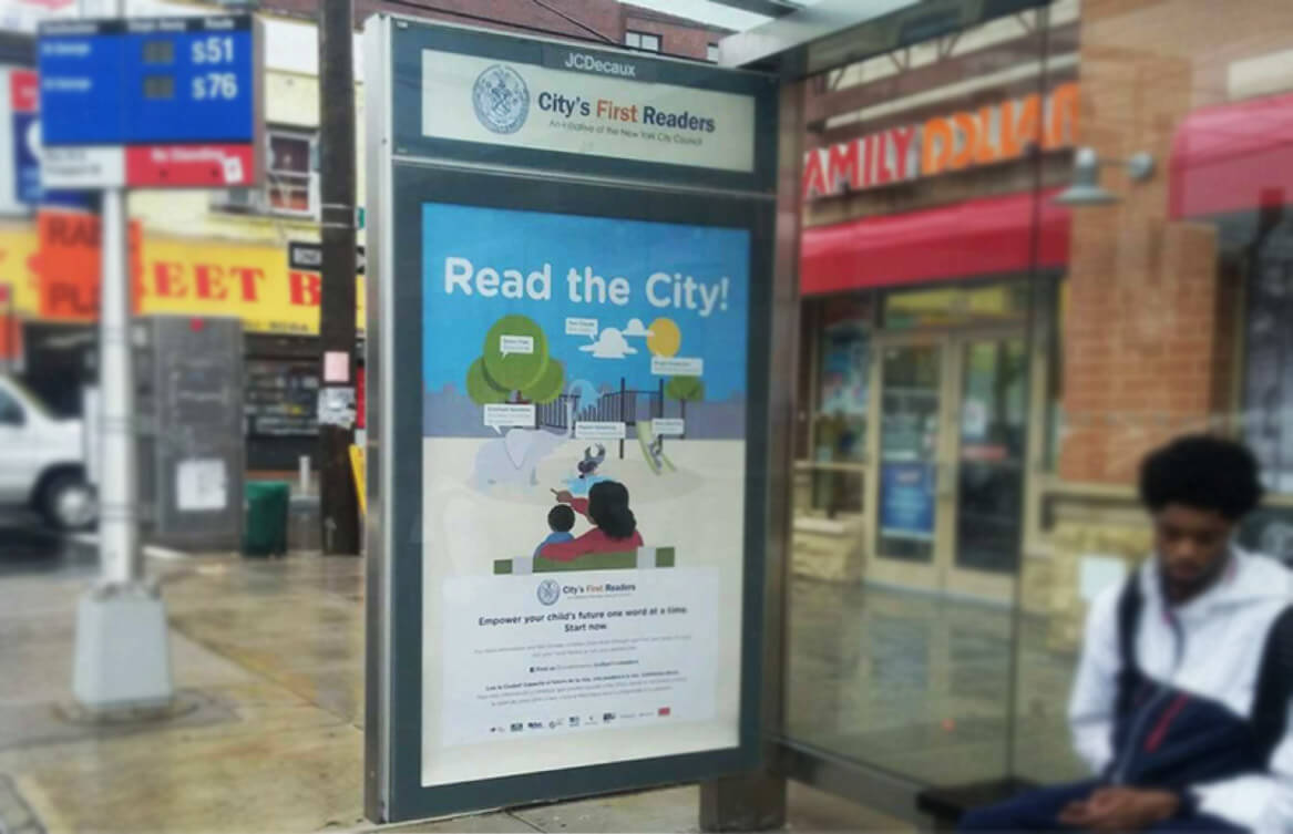 A 'Read the City!' ad in a bus shelter